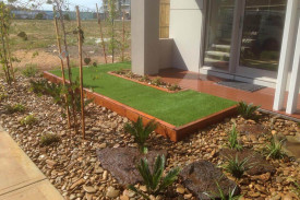 new home garden and pebbles