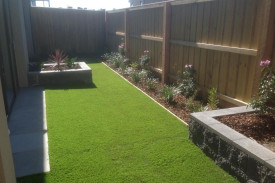 synthetic turf, garden around perimeter, garden bed