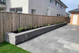 new home stone wall garden